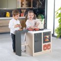 Kuchynka ostrovček s magickými cestovinami Kitchen Island 360° Smoby obojstranná s otvárateľnou rúrou a úložným priestorom 23 doplnkov