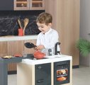 Kuchynka ostrovček s magickými cestovinami Kitchen Island 360° Smoby obojstranná s otvárateľnou rúrou a úložným priestorom 23 doplnkov
