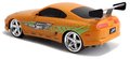 Autíčko na diaľkové ovládanie RC Brian's Toyota Supra Fast & Furious Jada oranžové dĺžka 18,5 cm 1:24