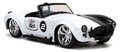 Autíčko DC 1965 Shelby Cobra 427 Jada kovové s otvárateľnými dverami a figúrkou Two Face dĺžka 13 cm 1:32