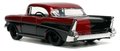 Autíčko DC Chevy Bel Air 1957 Jada kovové s otvárateľnými dverami a figúrkou Harley Quinn dĺžka 13 cm 1:32