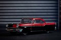 Autíčko DC Chevy Bel Air 1957 Jada kovové s otvárateľnými dverami a figúrkou Harley Quinn dĺžka 13 cm 1:32