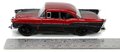 Autíčko DC Chevy Bel Air 1957 Jada kovové s otvárateľnými dverami a figúrkou Harley Quinn dĺžka 13 cm 1:32