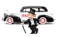 Autíčko Monopoly Chevy Master 1939 Jada kovové s otvárateľnými časťami a figúrkou Uncle Pennybags dĺžka 20 cm 1:24