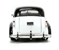 Autíčko Monopoly Chevy Master 1939 Jada kovové s otvárateľnými časťami a figúrkou Uncle Pennybags dĺžka 20 cm 1:24