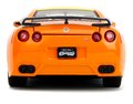 Autíčko Nissan GT-R 2009 Jada kovové s otvárateľnými časťami a figúrka Naruto dĺžka 20 cm 1:24