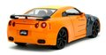 Autíčko Nissan GT-R 2009 Jada kovové s otvárateľnými časťami a figúrka Naruto dĺžka 20 cm 1:24