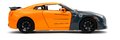 Autíčko Nissan GT-R 2009 Jada kovové s otvárateľnými časťami a figúrka Naruto dĺžka 20 cm 1:24