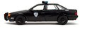 Autíčko RoboCop Ford Taurus 1986 Jada kovové s otvárateľnými časťami a figúrkou Robocop dĺžka 20 cm 1:24