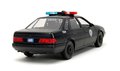 Autíčko RoboCop Ford Taurus 1986 Jada kovové s otvárateľnými časťami a figúrkou Robocop dĺžka 20 cm 1:24