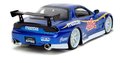 Autíčko Mazda RX-7 1993 Street Fighter Jada kovové s otvárateľnými časťami a figúrka Chun-Li dĺžka 20 cm 1:24