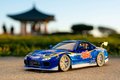 Autíčko Mazda RX-7 1993 Street Fighter Jada kovové s otvárateľnými časťami a figúrka Chun-Li dĺžka 20 cm 1:24