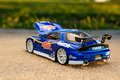Autíčko Mazda RX-7 1993 Street Fighter Jada kovové s otvárateľnými časťami a figúrka Chun-Li dĺžka 20 cm 1:24