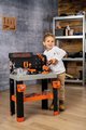 Pracovná dielňa so skladacím autíčkom Bricolo Pro Workbench Black&Decker Smoby s mechanickou vŕtačkou a náradím s montážnymi dielikmi 78 doplnkov výšk
