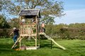Panoramatický domček na pilieroch Panorama 500 Wodden Playhouse Exit Toys cyprusový s pieskoviskom a šmykľavkou
