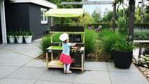 Kuchynka cédrová s tečúcou vodou Yummy 300 Outdoor Play Kitchen Exit Toys vonkajšia so strieškou rúrou na pečenie a kuchynským náradím od 24 mes