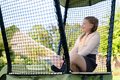 Hracia veža multifunkčná s 2 hojdačkami Ivy play tower double swing Exit Toys so stanom pieskoviskom a šmykľavkou kovová konštrukcia