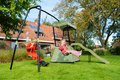 Hracia veža multifunkčná s 2 hojdačkami Ivy play tower double swing Exit Toys so stanom pieskoviskom a šmykľavkou kovová konštrukcia