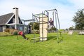 Multifunkčné fitness centrum GetSet Powerstation PS620 Exit Toys s boxovacím vrecom bradlami lavičkou gymnastickými kruhmi s lanom a lezeckou stenou