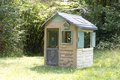 Domček ekologický Neo Jura Lodge Playhouse Green Smoby rozšíriteľný 2 dvere 2 okná s okenicami z recyklovaného materiálu s UV filtrom od 24 mes