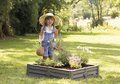 Pieskovisko a zeleninová záhradka k všetkým domčekom Square Garden Sandpit Smoby s podložkou na 75 kg piesku/60 l zeminy 76*76 cm od 24 mes