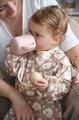Hrnček pre bábätká Silicone Training Cup Cotton Candy Beaba s vrchnákom na samostatné pitie ružový od 8 mes