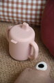 Hrnček pre bábätká Silicone Training Cup Cotton Candy Beaba s vrchnákom na samostatné pitie ružový od 8 mes
