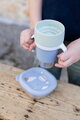 Hrnček pre deti Stainless Steel Learning Cup Click & Drink Pebble Beaba na samostatné pitie z nehrdzavejúcej ocele modro-zelený od 12 mes