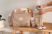 Prebaľovacia taška ku kočíku Geneva II Changing Bag Eco Clay Beaba s prebaľovacou podložkou béžová