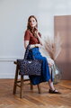 Prebaľovacia taška ku kočíku Madrid Changing Bag Leopard Beaba s prebaľovacou podložkou a popruhmi ku kočíku s leopardím vzorom