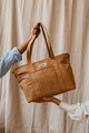 Prebaľovacia taška ku kočíku Madrid Changing Bag Ochre Beaba s prebaľovacou podložkou a popruhmi ku kočíku hnedá