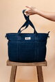 Prebaľovacia taška ku kočíku Madrid Bag Denim Beaba s prebaľovacou podložkou a popruhmi ku kočíku modrá