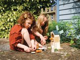 Drevený veterný mlyn Penny Windmill Tender Leaf Toys s pecou na pečenie chleba a 3 figúrky myšiek
